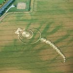 (Satan the great horned one) their are 14 circles including his two eyes because he lives in darkness eyes are not necessary. So we subtract to get 12 add the three average sized angels by the tail for the passages Isaiah 14:12-15 Double the first number because he is two faced to come up with Ezekiel 28:12-15