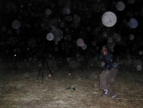 From Hans in Chile: Strange apearance here in the Chilean mountains. Dozens of small balls of light have apeared and have been revealed by use of flashlight. They range in size from golf balls to basketballs. The spheres are not visible with the naked eye as long the dog follows them as if he could see them, snapping them in the air or on the ground without visible effect. The spheres appear inside and outside the house for two days - July 29-30, 2002), we continue to take photographs.